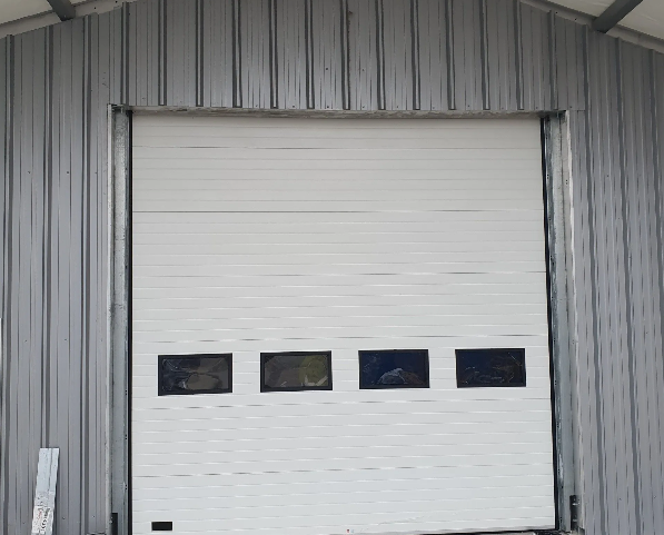 Porte industrielle sectionnelle Techni Fermetures